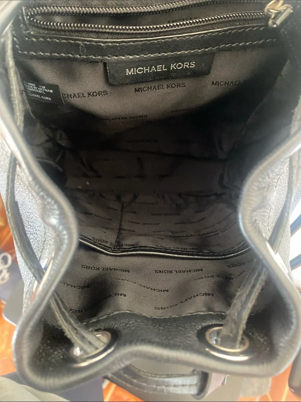 Michael Kors Black Leather Mini Backpack with Gold MK Logo